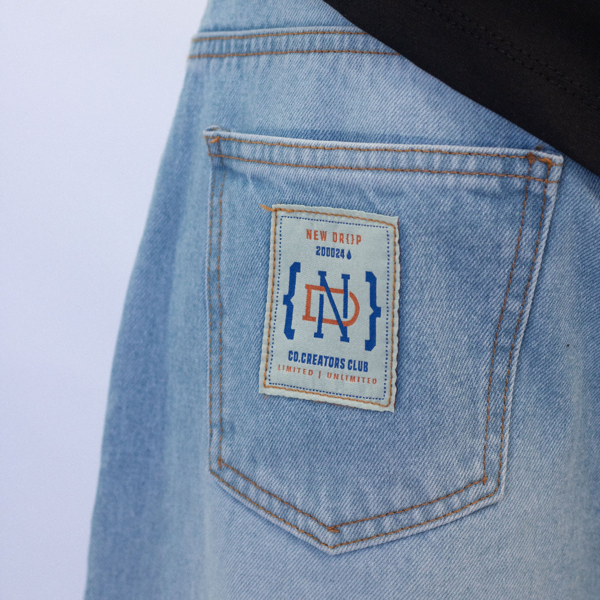 MENS WIDE JEANS WASHED BLUE BOX LOGO